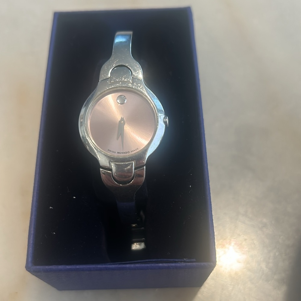 Women’s Movado watch with a pale pink face